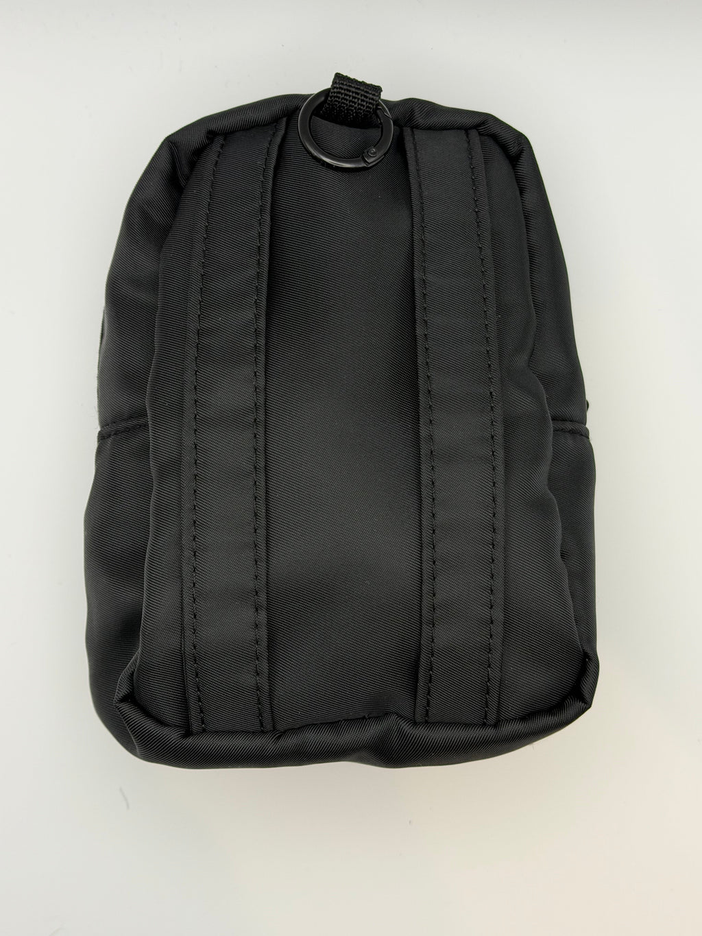 Black pouch with a strap on a white background
